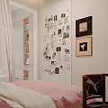 Creative Wall Decor With Collage of Photos Papers and Framed Artworks on Bedroom Wall
