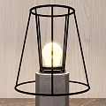 Modern Table Lamps With Concrete Base And Black White Cage Shades On Wooden Background