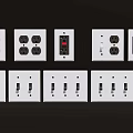 White Electrical Switch Panels With Various Socket And Switch Configurations