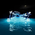 Elegant Illuminated Pergola With Blue Light Reflection In Water At Night