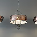 Three Copper Mosaic Chandeliers With Metal Frame Hanging On Gray Background