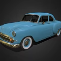 Blue Vintage Car With Classic Design Rounded Body And White Wall Tires