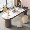 Modern Gray Desk with Laptop Gold Accents White Stools and Window View