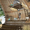 Round Wooden Hut With Thatch Roof Surrounded By Palm Trees And Natural Setting