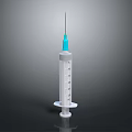Clear Plastic Syringe With Blue Needle Cap And Graduated Scale For Daily Use