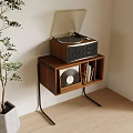 Wooden Side Table with Metal Legs Holding Record Player and Storage with Vinyl and Books