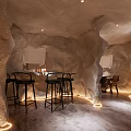 Unique Restaurant Interior Design With Cave Like Ceiling Blue Art Bar Counter And Black Stools