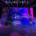Stunning Floral Installation In Lake Ville With Tropical Plant Backdrop And Purple Blue Lighting