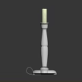 Elegant Silver Candlestick With White Candle And Round Base Design