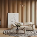 Elegant Living Room Interior Featuring Round Table Dried Flower Arrangement Black Vase And Beige Sofa