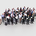 Large Group of Business Professionals Standing Together in Formal Attire Holding Briefcases