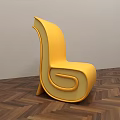 Yellow Modern Accent Chair With Unique Curved Design On Wooden Floor And Gray Wall