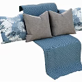 Blue and Gray Decorative Pillows with Floral Patterns and Geometric Blanket