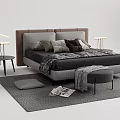 Modern Double Bed with Gray Bedding Maroon Pillows Bedside Tables Stool and Area Rug