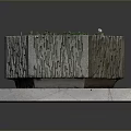 Green Plants Thriving in Hexagonal Stone Planter on Stone Slab Base