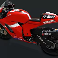 Red Ducati Racing Motorcycle with Sponsorship Logos and White Blue Stripes