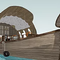 Wooden Ship Shaped Structure With Curved Roof And Waterfront Deck Design