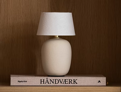 Minimalist Modern Table Lamp With White Lampshade And White Base On HANDVÄRK Book Wooden Background 3d model