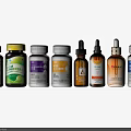 Assorted Health Supplement Bottles With Different Colors And Product Labels