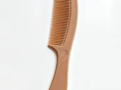 Brown Plastic Comb With Fine Teeth And Smooth Handle For Hair Care 3d model
