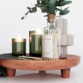 Stylish Bathroom Accessories With Green Plant Candles Cotton Swabs And Checkered Cloth On Wooden Tray