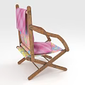Wooden Folding Lounge Chair With Pink Towel And Colorful Patterned Seat