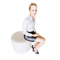 A Woman In White Shirt Black Leather Skirt Sitting On White Round Stool With Heels