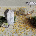 Outdoor Relaxation Space With Striped Umbrella Wooden Chair Yellow Leaves Rocks And Plants