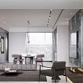Modern Minimalist Living And Dining Space With Cozy Sofa And Sleek Gray Wall Panels