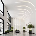 Modern Hotel Lobby Interior With Curved Ceiling Lighting Glass Walls And Green Plants
