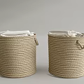 Woven Beige Storage Baskets With Handles Holding White Towels For Organization