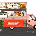 Pink Rumahfood Food Truck Offering Street Food With Outdoor Seating And Menu