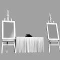 Minimalist Indoor Display With Two White Art Easels And Decorative Table