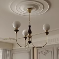 Elegant Chandelier With White Spherical Shades Golden Metal Frame And Ceiling Medallion In Classic Interior