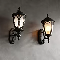 Classic Black Wall Sconces With Illuminated Glass Shades On Gray Wall