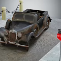 Rusty Vintage Car Parked Near Red Stop Sign With Yellow Bollards And Chains