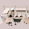 Scenic Camping Site With Multiple Tents Awnings Tables Chairs And String Lights