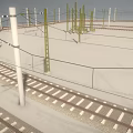 Outdoor Industrial Equipment Featuring Railway Tracks Electric Poles Power Lines and Fencing