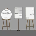 Various Modern Poster Designs On Gold Easels With Minimal Typography And Subtle Branding