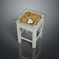 Three Fresh White Eggs On Straw Under Glass Cover On White Table