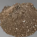 Pile of Mixed Garden Soil With Small Stones and Organic Matter