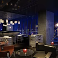 Modern Bar Interior With Open Wine Racks Stylish Lighting Black Flooring And White Frames