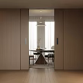 Minimalist Interior With Wooden Sliding Doors And Open Dining Space Featuring Round Table