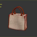 Elegant Beige Handbag With Textured Material And Orange Handles And Sleek Design