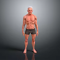 Elderly Man With Muscular Physique In Black Shorts Barefoot Standing Against Gray Background