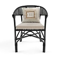 Stylish Natural Rattan Armchair With Red Geometric Cushion And Woven Accents