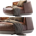Modern Brown Leather Single Sofa With Gray Base Striped Pillow And Cozy Throw Blanket