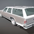 Vintage White Station Wagon With Roof Rack And Classic Silver Body Design
