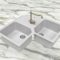 Double Bowl Kitchen Sink With Brass Faucet On Marble Countertop