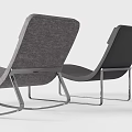 Modern Curved Lounge Chair With Metal Frame And Comfortable Dark Gray Upholstery Design